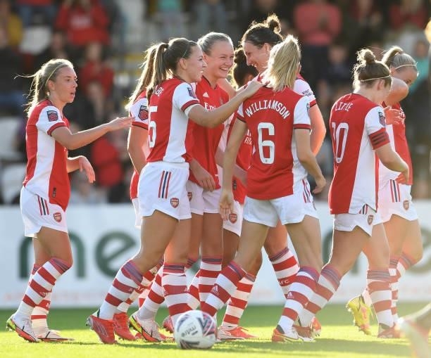 Frida Maanum celebrates scoring Arsenal's 3rd goal Leah Williamson and Katie McCabe during the Barclays FA Women's Super League match between Arsenal...