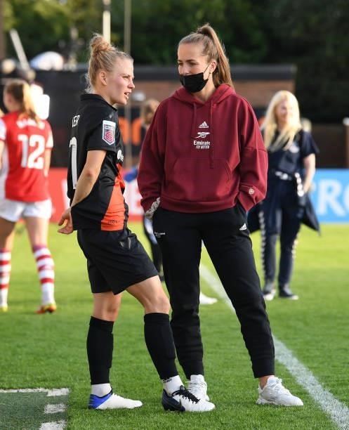 Lia Walti of Arsenal chats to former team mate Leonie Maier of Everton after the Barclays FA Women's Super League match between Arsenal Women and...