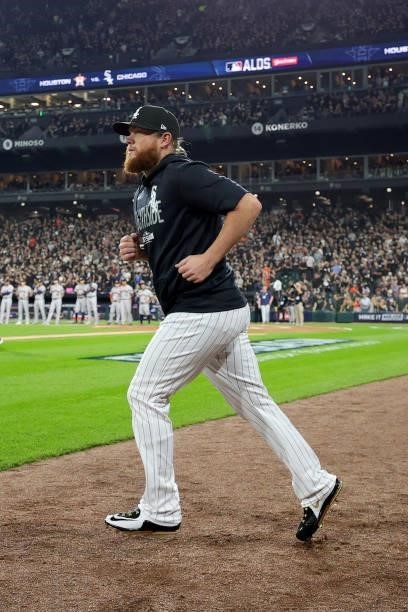 Craig Kimbrel of the Chicago White Sox walks onto the field during the pre-game ceremonies prior to game 3 of the American League Division Series...