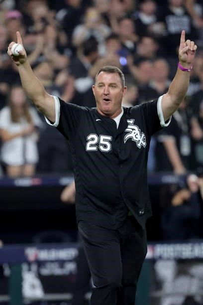 Former Chicago White Sox player Jim Thome walks onto the field to throw the first pitch prior to game 3 of the American League Division Series 2...