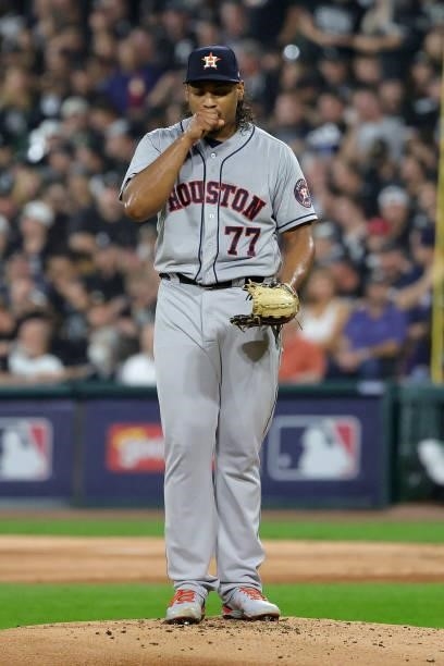 Luis Garcia of the Houston Astros prepares to throw a pitch in the first inning during game 3 of the American League Division Series against the...