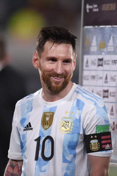 Lionel Messi of Argentina smiles after winning during a match between Argentina and Uruguay as part of South American Qualifiers for Qatar 2022 at...