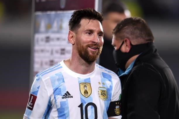 Lionel Messi of Argentina smiles after winning during a match between Argentina and Uruguay as part of South American Qualifiers for Qatar 2022 at...