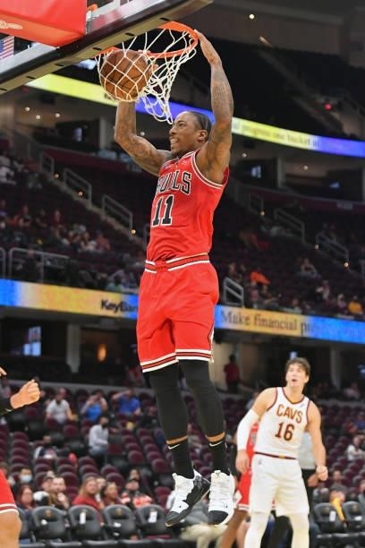 DeMar DeRozan of the Chicago Bulls dunks during the fourth quarter against the Cleveland Cavaliers at Rocket Mortgage Fieldhouse on October 10, 2021...