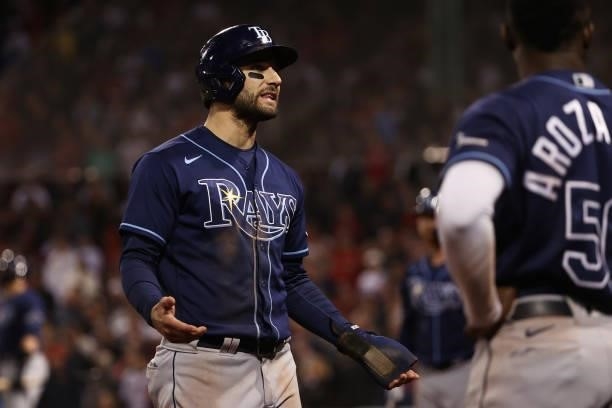 Kevin Kiermaier of the Tampa Bay Rays reacts after his ground rule double in the 13th inning against the Boston Red Sox during Game 3 of the American...