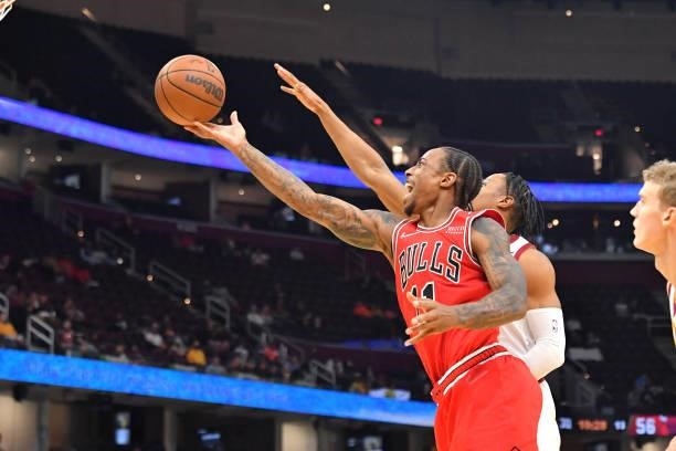 DeMar DeRozan of the Chicago Bulls shoots over Isaac Okoro of the Cleveland Cavaliers during the third quarter at Rocket Mortgage Fieldhouse on...
