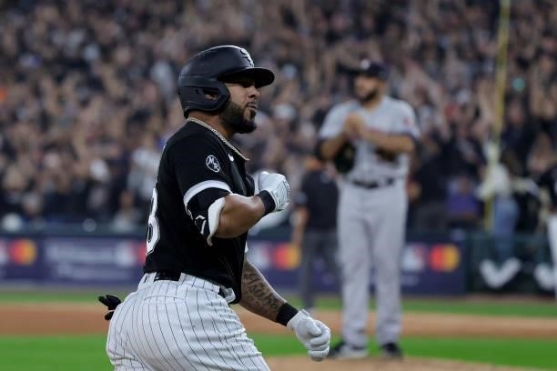 Leury Garcia of the Chicago White Sox hits a three run home run in the third inning during game 3 of the American League Division Series against the...