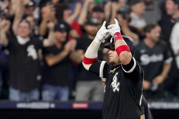 Yasmani Grandal of the Chicago White Sox celebrates a two run home run in the third inning during game 3 of the American League Division Series...