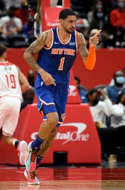 Obi Toppin of the New York Knicks celebrates during the second half against the Washington Wizards at Capital One Arena on October 09, 2021 in...