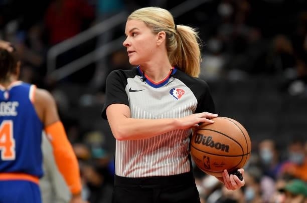Referee Jenna Schroeder officiates the game between the Washington Wizards and the New York Knicks at Capital One Arena on October 09, 2021 in...