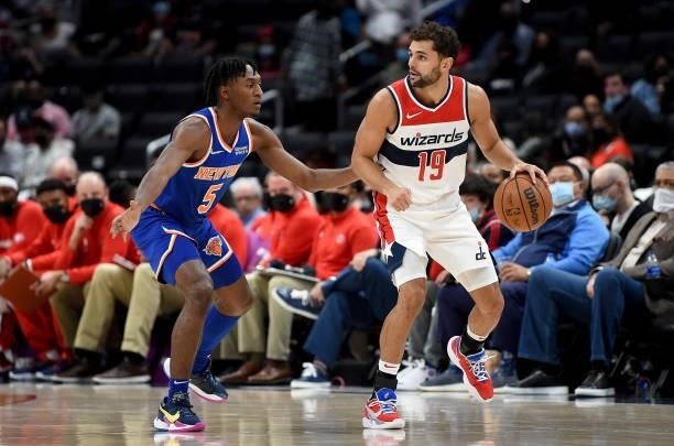 Raul Neto of the Washington Wizards handles the ball against Immanuel Quickley of the New York Knicks at Capital One Arena on October 09, 2021 in...