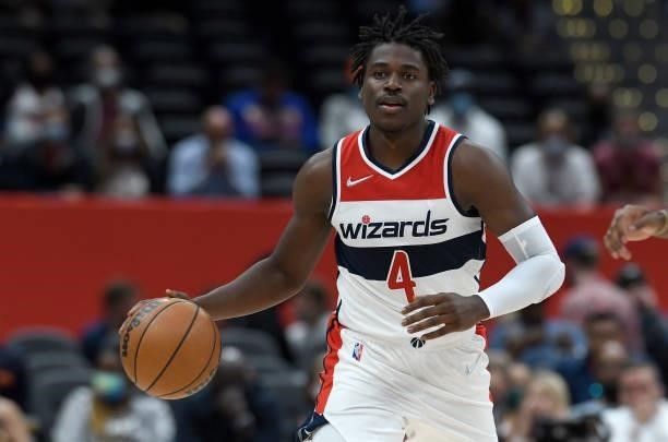 Aaron Holiday of the Washington Wizards handles the ball against the New York Knicks at Capital One Arena on October 09, 2021 in Washington, DC. NOTE...