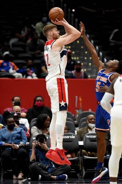 Davis Bertans of the Washington Wizards shoots the ball against the New York Knicks at Capital One Arena on October 09, 2021 in Washington, DC. NOTE...
