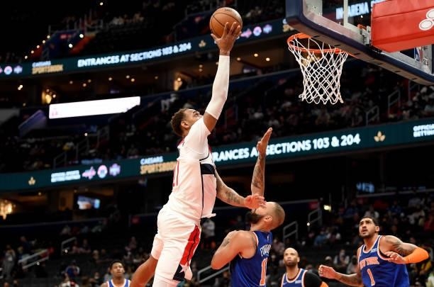 Daniel Gafford of the Washington Wizards drives to the hoop against the New York Knicks at Capital One Arena on October 09, 2021 in Washington, DC....
