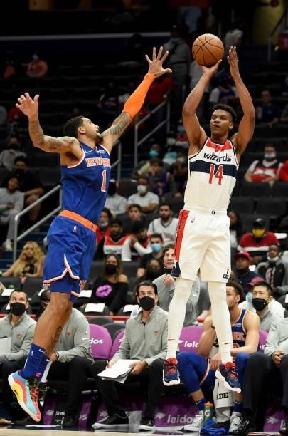 Isaiah Todd of the Washington Wizards shoots the ball against Obi Toppin of the New York Knicks at Capital One Arena on October 09, 2021 in...