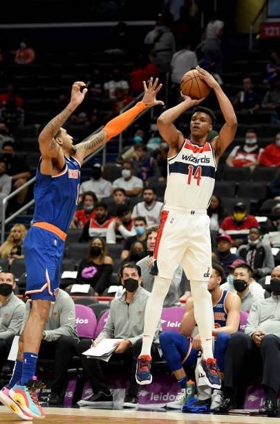 Isaiah Todd of the Washington Wizards shoots the ball against Obi Toppin of the New York Knicks at Capital One Arena on October 09, 2021 in...