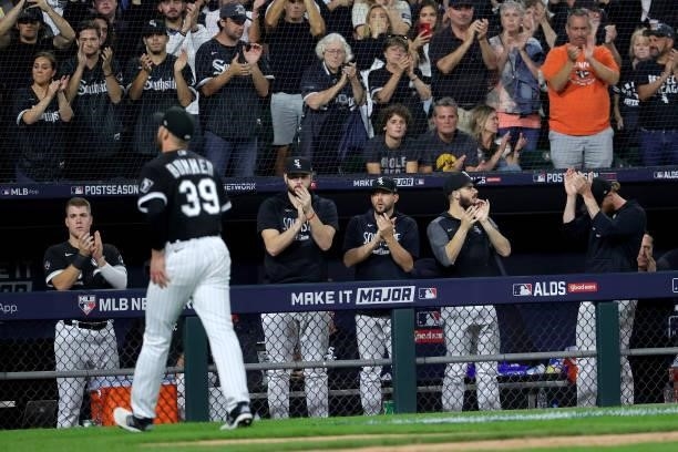 Chicago White Sox plays and fans cheer for Aaron Bummer of the Chicago White Sox as he leaves the field in the eighth inning during game 3 of the...
