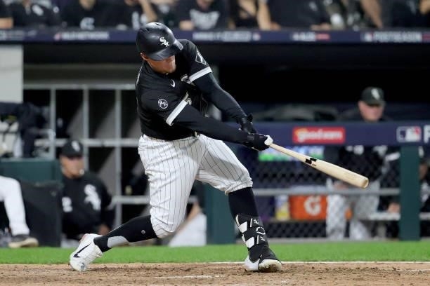 Andrew Vaughn of the Chicago White Sox hits a RBI double in the eighth inning during game 3 of the American League Division Series against the...