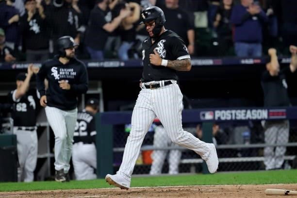 Yoan Moncada of the Chicago White Sox scores a run in the eighth inning during game 3 of the American League Division Series against the Houston...