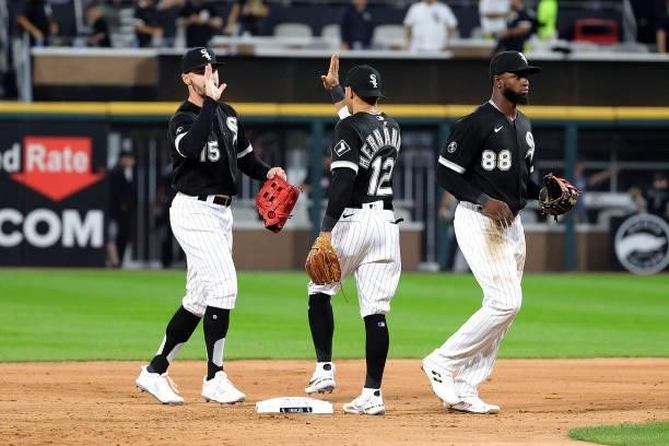 Adam Engel and Cesar Hernandez of the Chicago White Sox celebrate a win over the Houston Astros in game 3 of the American League Division Series at...