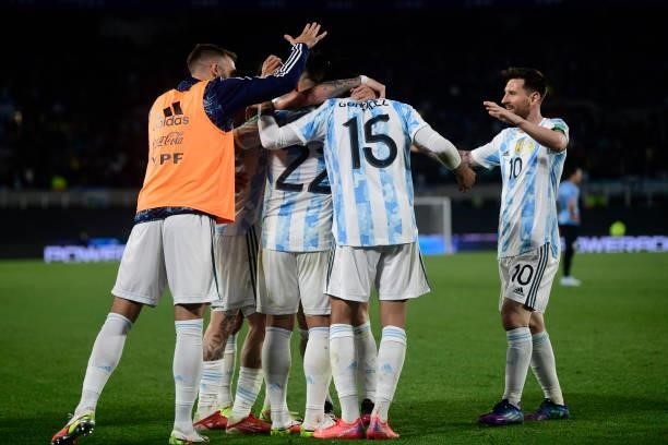 Lautaro Martinez of Argentina celebrates with teamamtes after scoring the third goal of his team during a match between Argentina and Uruguay as part...