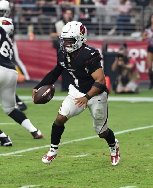 Kyler Murray of the Arizona Cardinals runs with the ball against the San Francisco 49ers at State Farm Stadium on October 10, 2021 in Glendale,...