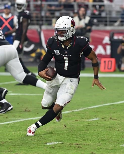 Kyler Murray of the Arizona Cardinals runs with the ball against the San Francisco 49ers at State Farm Stadium on October 10, 2021 in Glendale,...