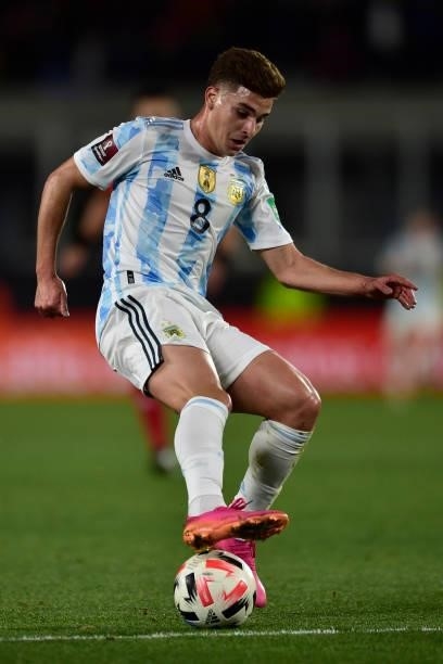 Julian Alvarez of Argentina drives the ball during a match between Argentina and Uruguay as part of South American Qualifiers for Qatar 2022 at...