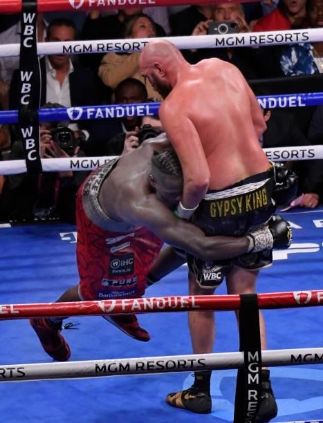 Deontay Wilder grabs Tyson Fury during the World Heavyweight Championship III trilogy fight at T-Mobile Arena Saturday October 9, 2021. Tyson Fury...