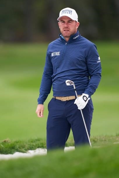 Richie Ramsay of Scotland watches his shot during Day Four of The Open de Espana at Club de Campo Villa de Madrid on October 10, 2021 in Madrid,...
