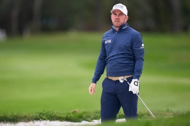 Richie Ramsay of Scotland watches his shot during Day Four of The Open de Espana at Club de Campo Villa de Madrid on October 10, 2021 in Madrid,...