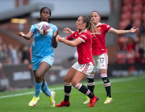 Khadija Shaw of Manchester City and Katie Zelem of Manchester United in action during the Barclays FA Women's Super League match between Manchester...