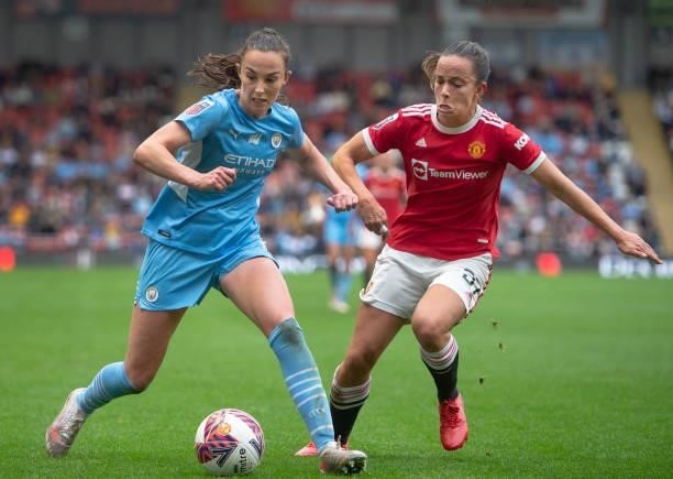 Caroline Weir of Manchester City and Lucy Staniforth of Manchester United in action during the Barclays FA Women's Super League match between...