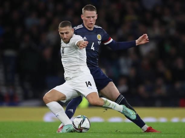 Shon Weissman of Israel vies with Scott McTominay of Scotland during the 2022 FIFA World Cup Qualifier match between Scotland and Israel at Hampden...