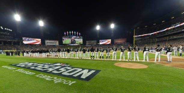The Chicago White Sox line up for the National Anthem prior to Game Three of the American League Division Series against the Houston Astros on...