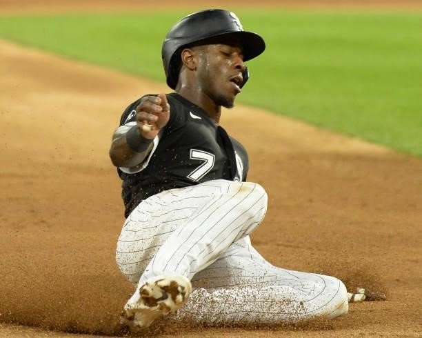 Tim Anderson of the Chicago White Sox slides safely into third base in the fourth inning during Game Three of the American League Division Series...