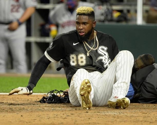 Luis Robert of the Chicago White Sox looks on after scoring a run in the fourth inning during Game Three of the American League Division Series...