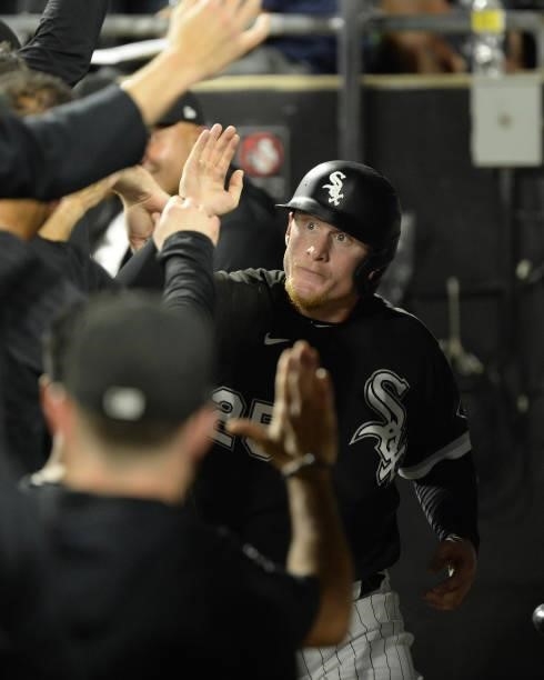 Andrew Vaughn of the Chicago White Sox celebrates with teammates during Game Three of the American League Division Series against the Houston Astros...