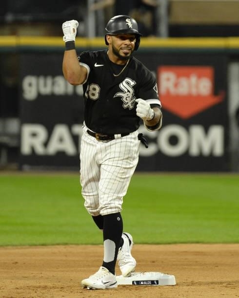 Leury Garcia of the Chicago White Sox reacts after hitting a double in the eighth inning during Game Three of the American League Division Series...