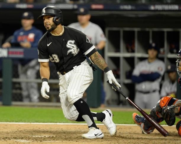 Leury Garcia of the Chicago White Sox hits a double in the eighth inning during Game Three of the American League Division Series against the Houston...