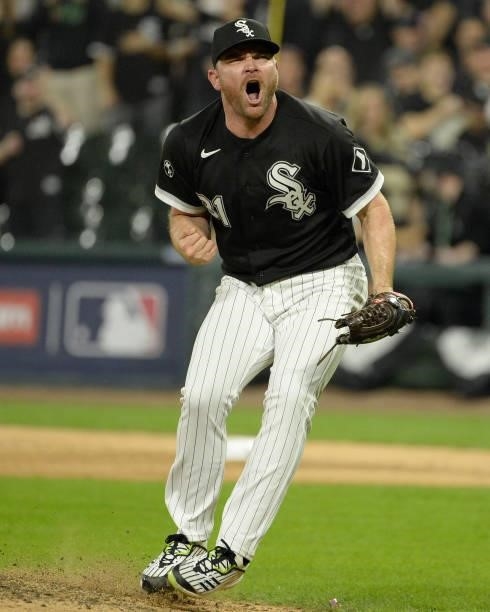 Liam Hendriks of the Chicago White Sox reacts after recording the final out of Game Three of the American League Division Series against the Houston...
