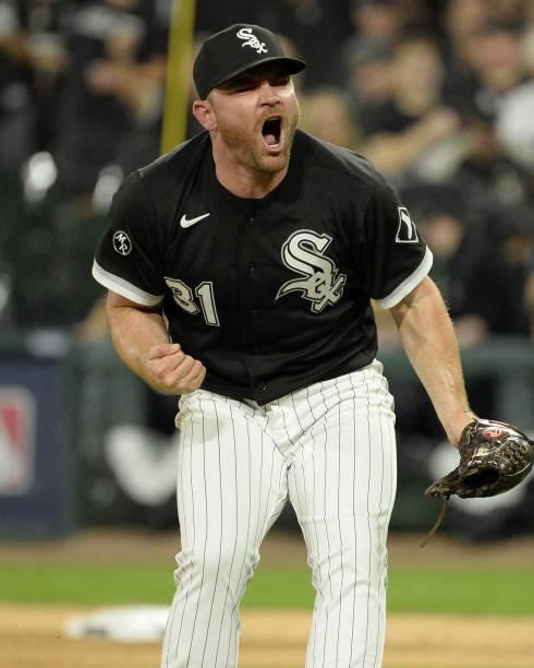 Liam Hendriks of the Chicago White Sox reacts after recording the final out of Game Three of the American League Division Series against the Houston...