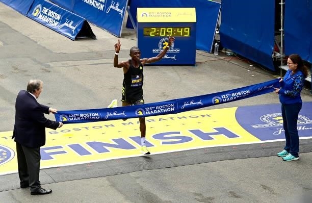 Benson Kipruto of Kenya reacts as he crosses the finish line to win the 125th Boston Marathon on October 11, 2021 in Boston, Massachusetts.