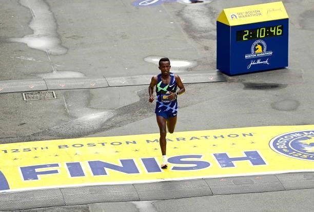 Tsedat Ayana of Ethiopia crosses the finish line for fourth place during the 125th Boston Marathon on October 11, 2021 in Boston, Massachusetts.