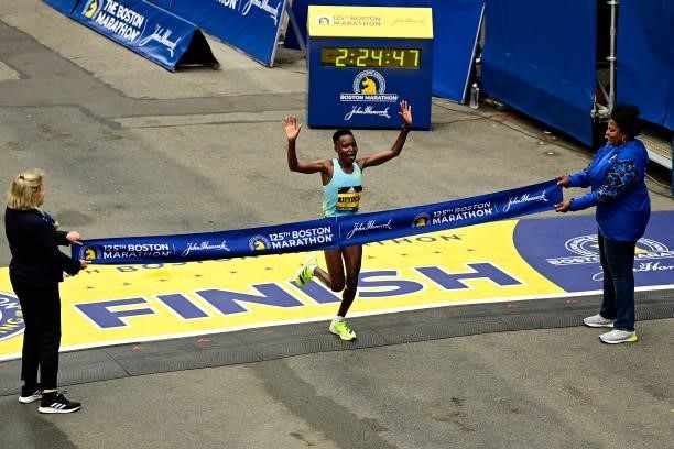 Diana Kipyogei of Kenya crosses the finish line to win the 125th Boston Marathon on October 11, 2021 in Boston, Massachusetts.