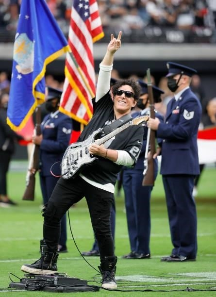 Recording artist Neal Schon of the band Journey performs the American national anthem before a game between the Chicago Bears and the Las Vegas...