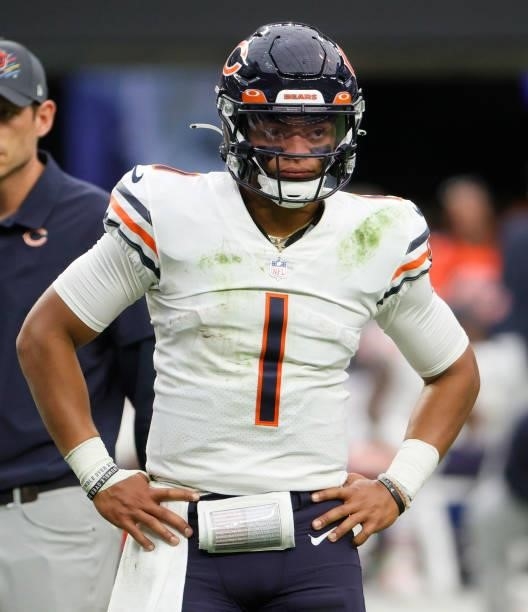 Quarterback Justin Fields of the Chicago Bears stands on the field during a timeout in a game against the Las Vegas Raiders at Allegiant Stadium on...