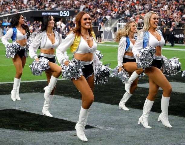 Members of the Las Vegas Raiderettes cheerleading squad perform during the Raiders' game against the Chicago Bears at Allegiant Stadium on October...