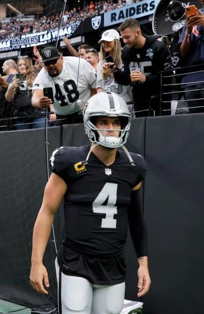 Quarterback Derek Carr of the Las Vegas Raiders waits to be introduced before a game against the Chicago Bears at Allegiant Stadium on October 10,...