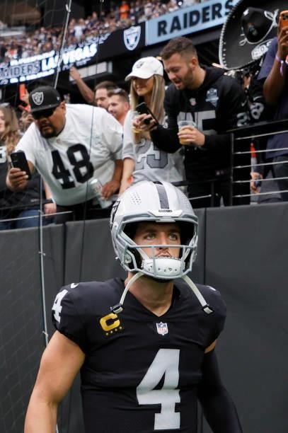 Quarterback Derek Carr of the Las Vegas Raiders waits to be introduced before a game against the Chicago Bears at Allegiant Stadium on October 10,...